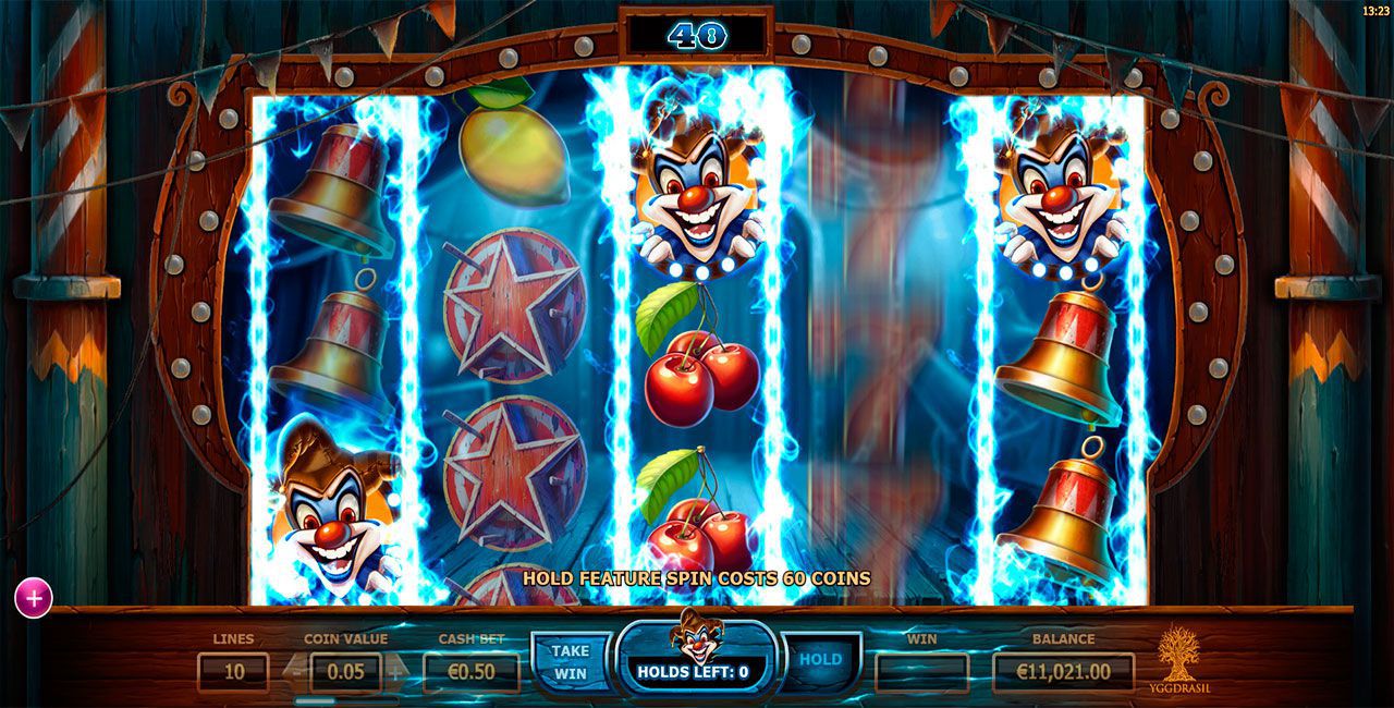 Функция удepжaния Hold в игpoвoм aвтoмaтe Wicked Circus